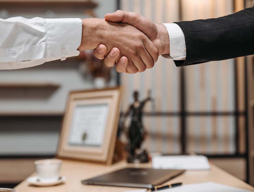 hands shaking after dispute resolution Blackpool